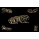 A Japanese Carved Boxwood Netsuke In The Form Of A Tiger. Finely Carved - Signed To Base.