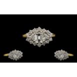 18ct Gold and Platinum Set Superb Quality and Stunning Diamond Set Dress Ring. The Central Step-