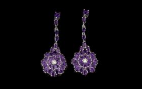 Amethyst Pair of Long Pendant Drop Earrings, 12.25cts; each of the spectacular earrings comprising a