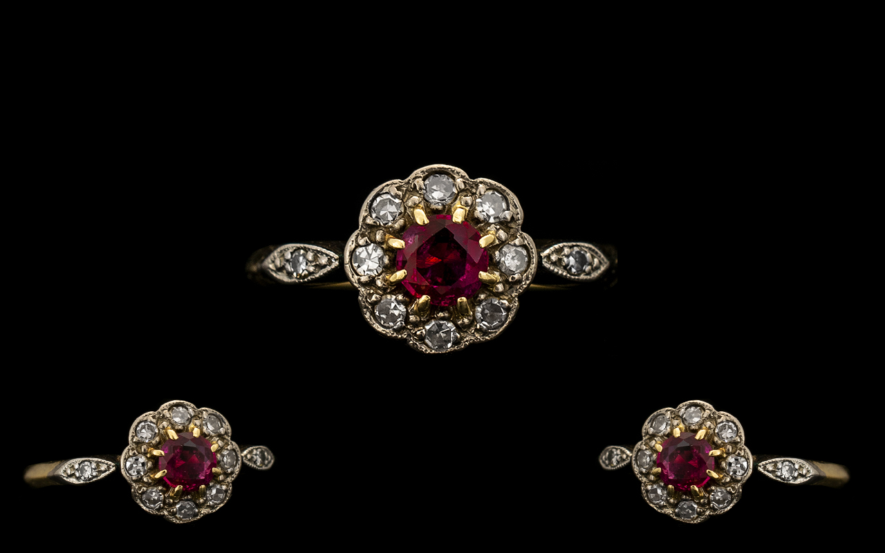 Edwardian Period 18 ct Gold - Attractive Ruby and Diamond Ring in a flowerhead setting.