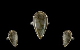 Labradorite Pear Cut Solitaire Ring, an elongated pear cut 24ct cabochon of labradorite,
