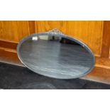Chrome Art Deco Oval Shaped Mirror with a Ribbon Design to the Top Edge. c.1930's.