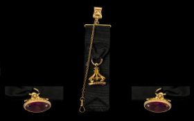 Antique Georgian Pinchbeck Gentleman's Fob on black silk ribbon, with a pocket device attached.