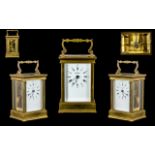 French Nice Quality 11 Jewell's 8 Day Brass Carriage Clock - features white porcelain dial visible