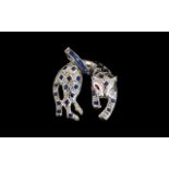 18 ct White Gold Exquisite and High Quality Sapphire and Diamond Set Figural Pendant in the form of