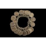 Silver Curb Bracelet Loaded with Over 20 United Kingdom Sixpences, Dating from the 1930's - 1960's,