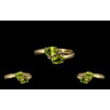 Ladies 9ct Gold Attractive Two Stone Peridot Set Dress Ring. Marked 9.375. Ring Size - O.