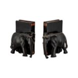 Pair of Vintage Wooden Elephant Bookends. Pair of bookends in black wood, each depicting an elephant