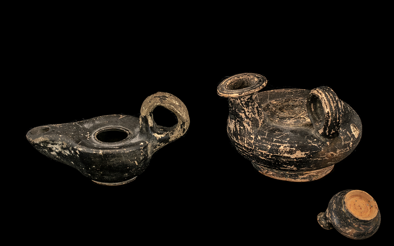 Antique Terracotta Oil Lamps, probably Croatian, with black Attica type glaze. A/f.