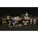 Collection of Silver Plated Ware comprising coffee pot raised on four decorative feet;