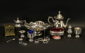 Collection of Silver Plated Ware comprising coffee pot raised on four decorative feet;