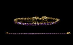 Amethyst Tennis Bracelet, deep purple, oval cut amethysts totalling 11.