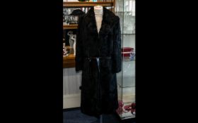 Ladies Full Length Black Fur Coat by Infurs, with leather tie belt,
