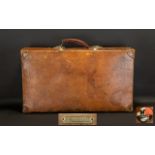 Early 20th Century Leather Suitcase. Superior Leather suitcase, made by Revelation, has the