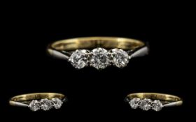 18ct Gold - Attractive 3 Stone Diamond Set Dress Ring. Marked 18ct Gold. c.1950's. The Three