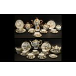 Two Oriental Part Tea Services to include a Tea Pot, Milk Jug, Lidded Sugar Pot, five cups,