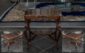 Edwardian Carved Mahogany Centre Parlour Table with a shaped top and fancy carved cabriole legs