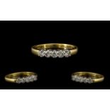 18ct Gold Pleasing 5 Stone Diamond Set Ring Channel Set full hallmark for 18ct. The 5 round