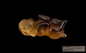 Daum French Brown Glass Figure of a small puppy on its back. Signed. 3" in length.