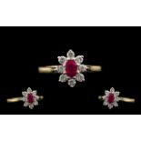 18ct Gold and Attractive Petite Ruby and Diamond Set Dress Ring with flower head design/setting.