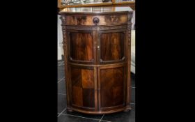 An Edwardian Bow Fronted Adapted Music Cabinet - with single drawer above two panelled doors and a