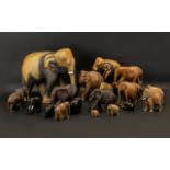 Eighteen Assorted Wooden Elephant Ornaments - Varying in quality and size from around 2" to 18" in