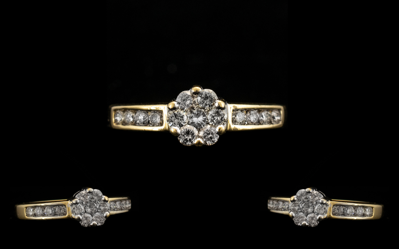 18 Carat Gold Attractive and Diamond Set Ladies Cluster Ring. Marked 750. 18ct to interior of shank.
