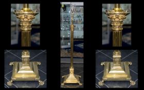 A Fine Quality Gilt Brass Corinthian Column Extending Standard Lamp with Stepped Base, Supported