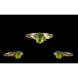 Ladies 9ct Gold - Attractive Single Stone Peridot Set Dress Ring. Marked 9.375. Ring Size - O.