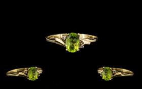 Ladies 9ct Gold - Attractive Single Stone Peridot Set Dress Ring. Marked 9.375. Ring Size - O.