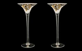 A Pair of Goebel Orchid Glass Candlesticks, 16 inches high.