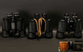 Three Sets of Binoculars comprising Barco Field glasses 7 x 50 with tan leather carry case;