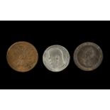 An 1899 Silver Russian Ruble, an 1857 Uraguay 40 Cent coin and a GB 1797 cartwheel penny,