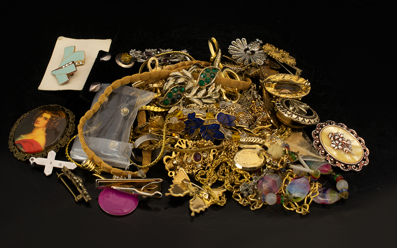 A Musical Jewellery Box containing a collection of Assorted Costume Jewellery.