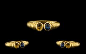 18ct Gold Attractive 2 Stone Yellow and Blue Sapphire Set Dress Ring - attractive rub over