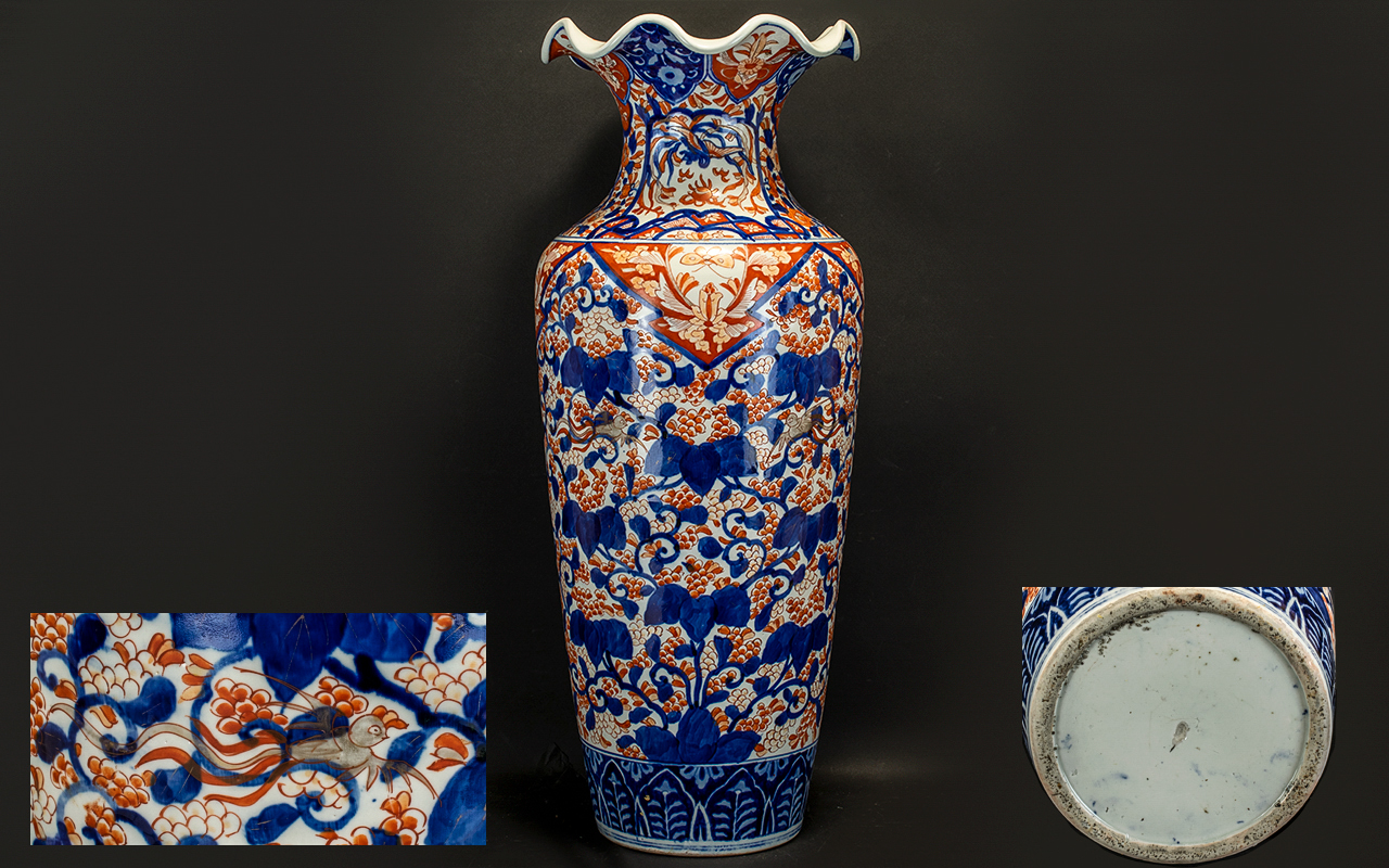 Large Antique Imari Vase with a wavy top,