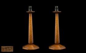 Pair of Liberty Arts and Crafts Oak Tapering Shaped Candlesticks In The Manner of Arch Bold Knox