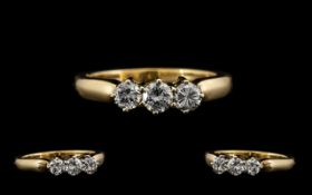 18ct Gold Attractive 3 Stone Diamond Set Ring marked 18ct Gold. The three round brilliant cut