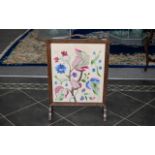 Mahogany Framed Embroidered Fire Screen, finely stitched with colourful flowers.