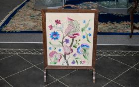 Mahogany Framed Embroidered Fire Screen, finely stitched with colourful flowers.