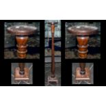 Edwardian Mahogany Torchere Stand with shaped drop column. Terminating on a square base.