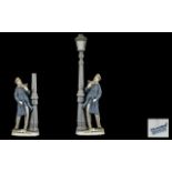 A Lladro Poreclain Figure of a Lamplighter Height (cm) 48 Width (cm) 14 Length (cm) 10.