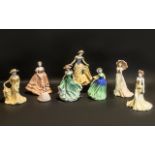 A Collection of Eight Porcelain Figures all boxed.