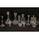 Collection of Glassware comprising a pair of candlesticks, two glass decanters and a ship's decanter