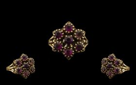 Ladies 9ct Gold Garnet Set Dress Ring Flowerhead Setting - fully hallmarked for 9.375.