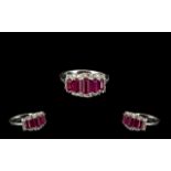 Ruby and Zircon Graduated Band Ring, comprising five graduated baguette cut rubies of good and