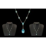 Ladies Attractive 9ct Gold Aquamarine Stone Set Necklace of impressive proportions and design.