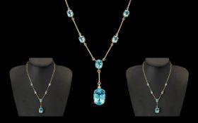 Ladies Attractive 9ct Gold Aquamarine Stone Set Necklace of impressive proportions and design.