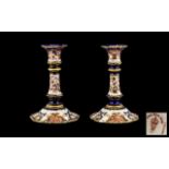 Royal Crown Derby Pair of Candlesticks - date 1899. Hairline crackes to both bases.