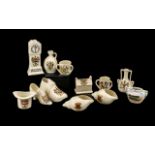 A Small Collection of Crested Ware to include a top hat, boot, grandfather clock, tyg,